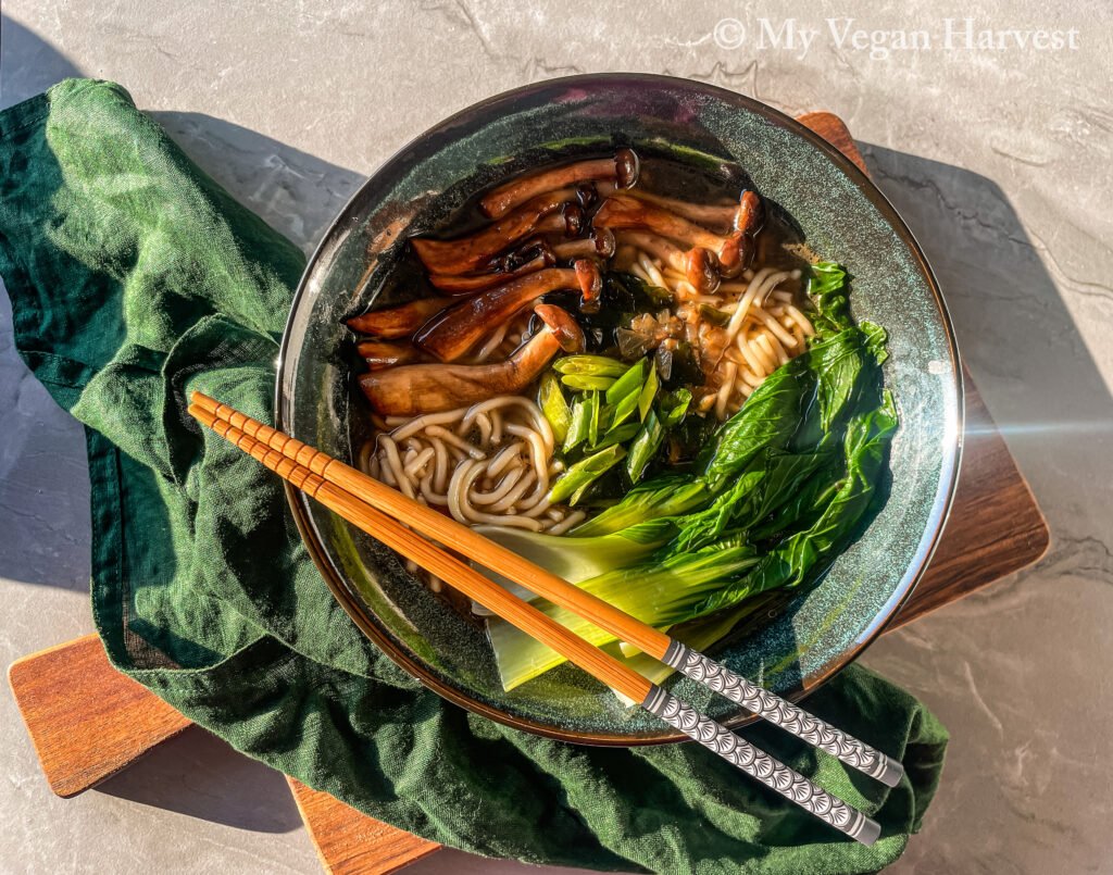 A delicious bowl of mushroom ramen noodle soup with a savory and rich broth